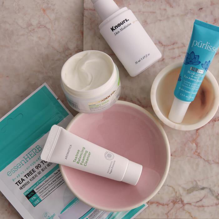 A flatlay image of skincare products for acne Mobile